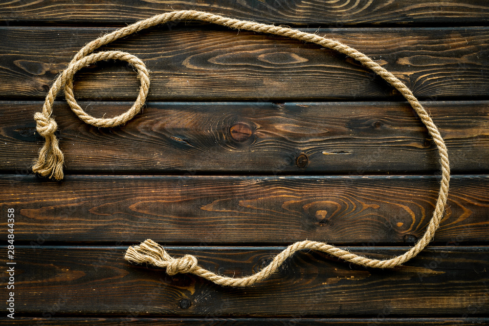 rope frame on wooden background top view mock-up rope frame on wooden background top view mock-up