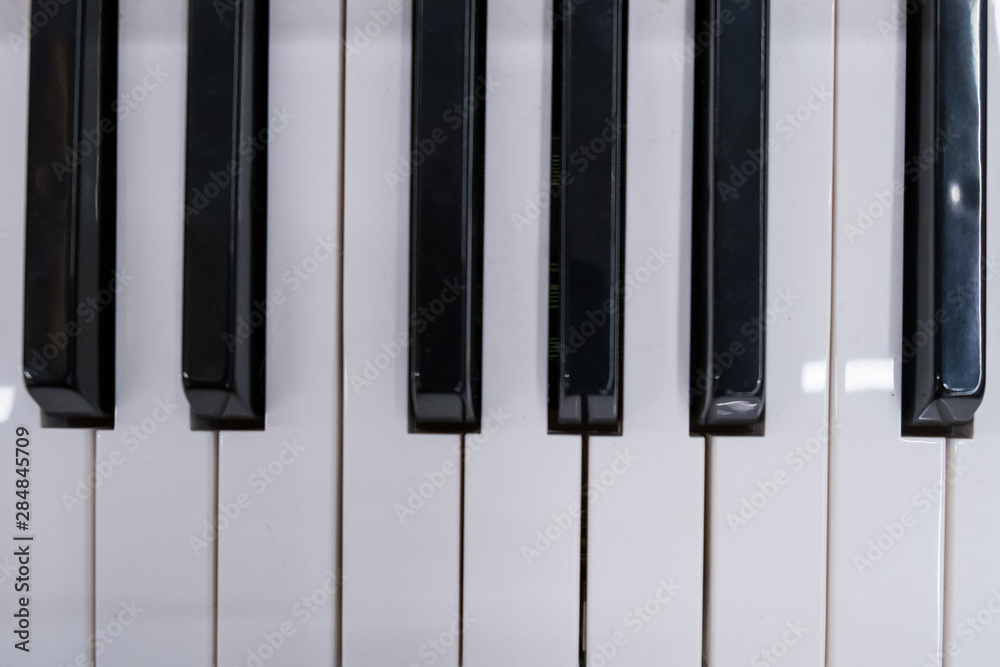 Piano keys viewed from above. Black and old keys Piano keys viewed from above. Black and old keys