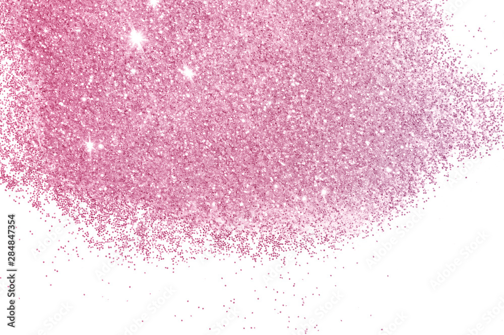 Pink glitter sparkles on white background