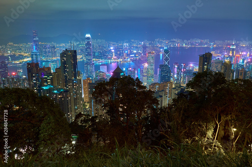 The famous view from Victoria Peak to Victoria Harbor and Hong Kong at night