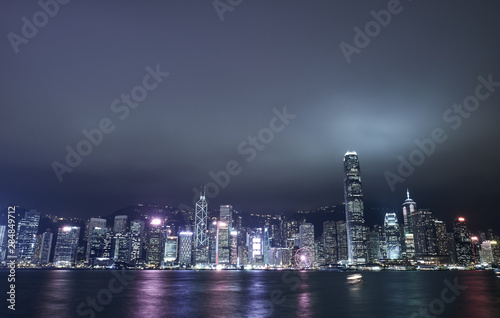 Central district in Hong Kong at night. City landscape. © badahos