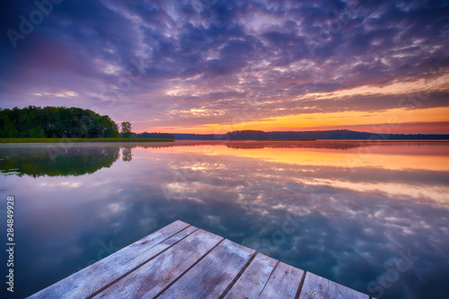 Fototapeta Naklejka Na Ścianę i Meble -  Beautiful summer sunrise over lake