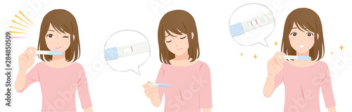妊娠検査薬を確認する女性