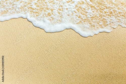 sea foam on sand