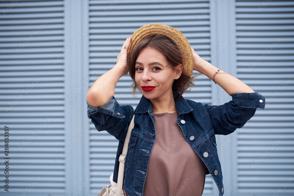 Beautiful woman in a hat smiles and enjoy life Beautiful woman in a hat smiles and enjoy life