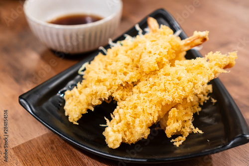 Tempura Shrimps (Deep Fried Shrimps) with sauce in Japanese restaurant.