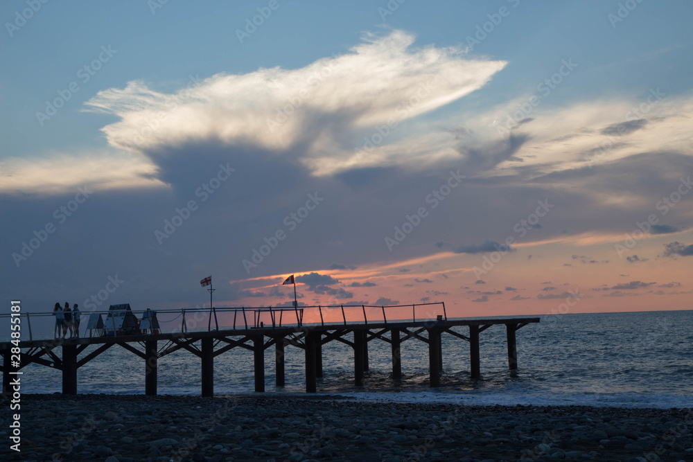 Exotic Paradise, sunset. Tourism and Vacations Concept. Resort. black sea Dock on the beach Batumi