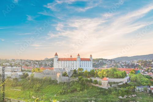 Photography Beautiful view of the Bratislava castle on the banks of the Danube in the old town of Bratislava, Slovakia on a sunny summer day