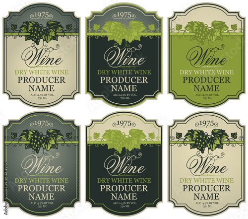 Vector set of labels for white wine with bunches of grapes and calligraphic inscriptions in retro style in figured frames