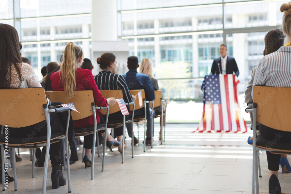 Fototapeta premium Male speaker speaks in a business seminar