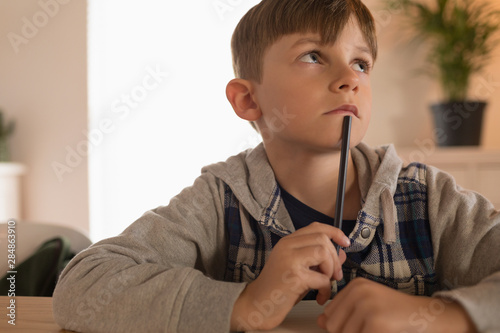Boy doing his homework at home