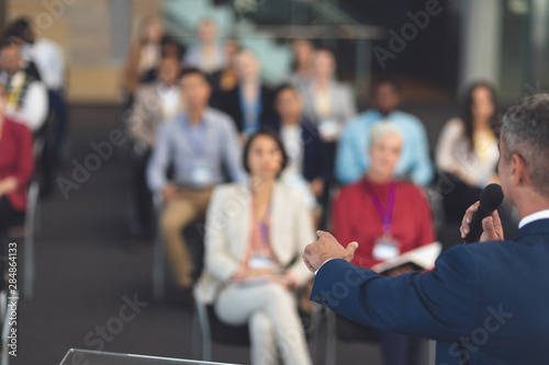 Businessman speaks in a business seminar 