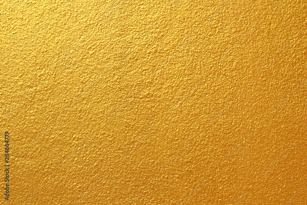 Gold concrete wall on background texture. Gold concrete wall on background texture.