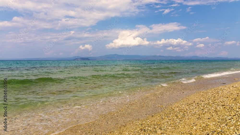 Time lapce of the Glarokavos Beach in kassandra at Halkidiki, Greece Time lapce of the Glarokavos Beach in kassandra at Halkidiki, Greece