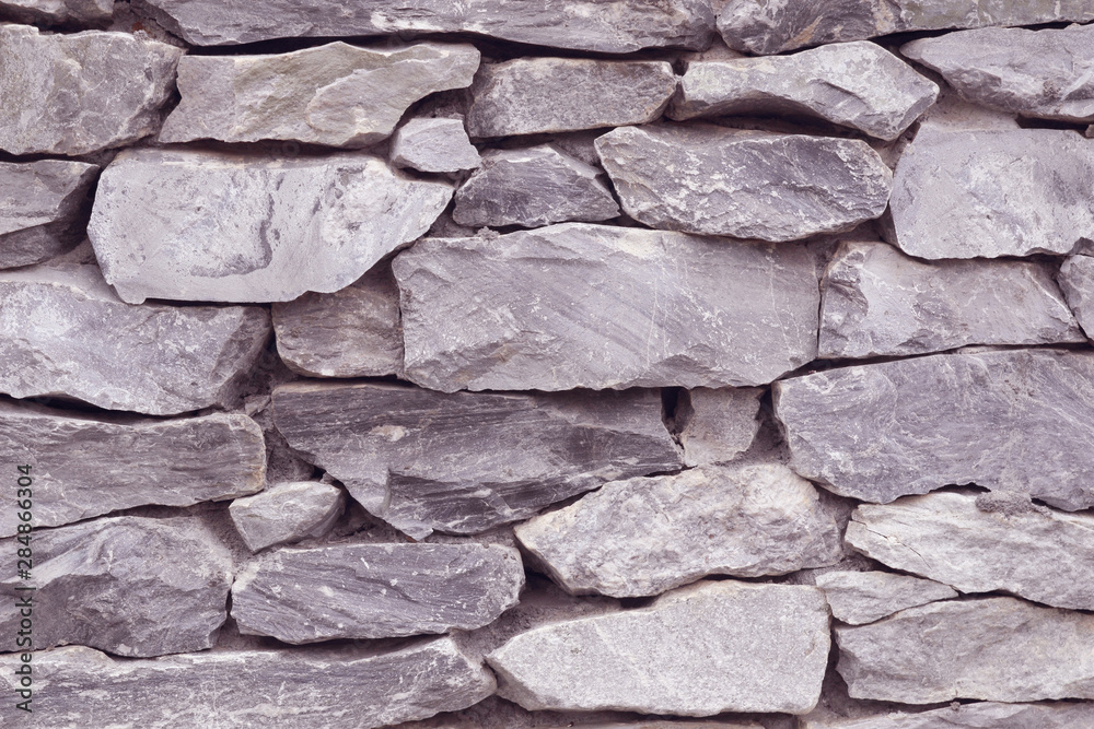 Fototapeta premium Old stone wall texture and blackground