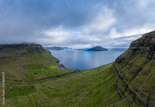 Nodradalur aerial panoramic view under the clouds  Eysturoy  Faroe Islands