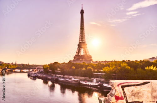 Blurred foto of Eiffel Tower from a less usual angle. Picture taken from the Bir-Hakeim Bridge