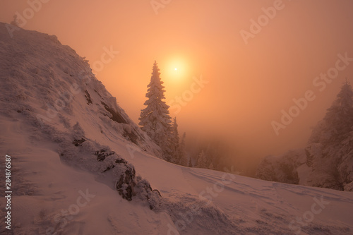 Sunrise in winter at the top of the mountain