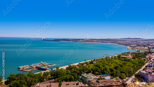 magnificent summer landscape with views of the sea and the Crimean bridge in the city of Kerch from mount Mithridates
