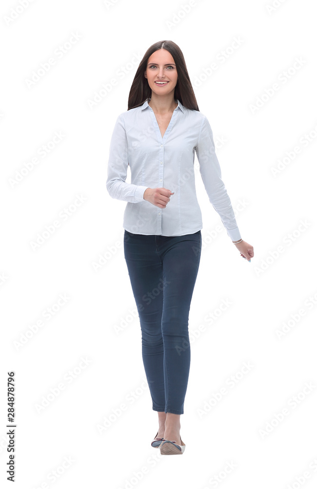 smiling young woman stepping forward. isolated on white smiling young woman stepping forward. isolated on white