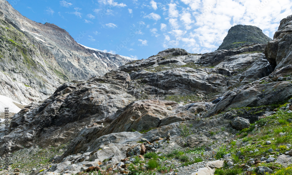 view of mountains and glaciers, lots of rocks view of mountains and glaciers, lots of rocks