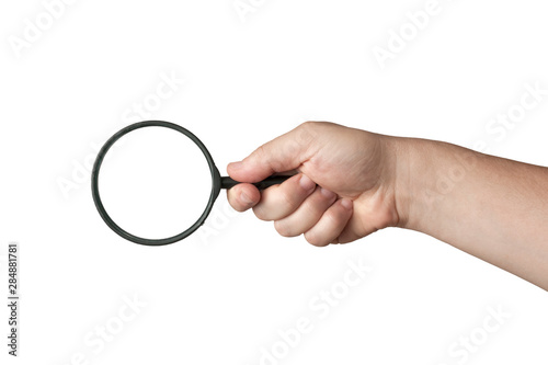 Man hand with magnifying glass on white background