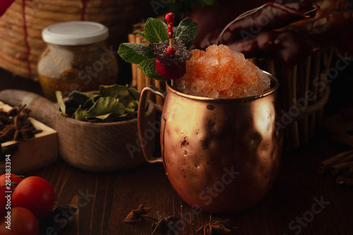 Photography moscow mule cocktail on a wooden background