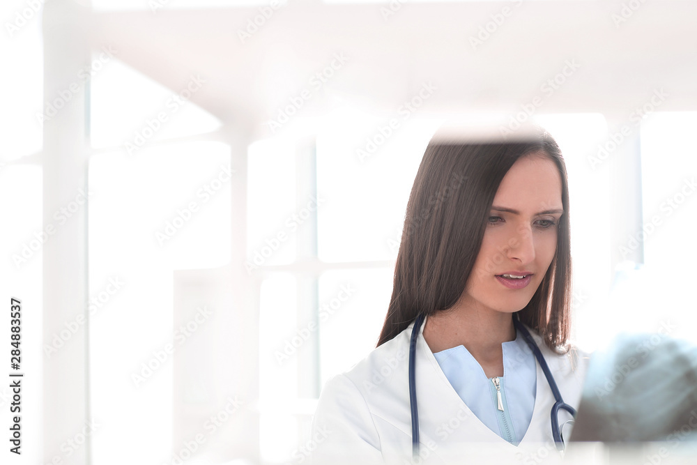 background image of smiling woman doctor with patient x-ray background image of smiling woman doctor with patient x-ray