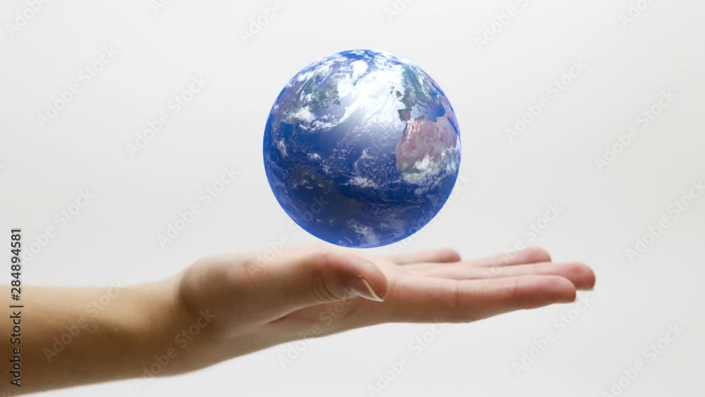 Planet Earth spinning over a human hand Seamless looping motion background illustration Planet Earth spinning over a human hand Seamless looping motion background illustration