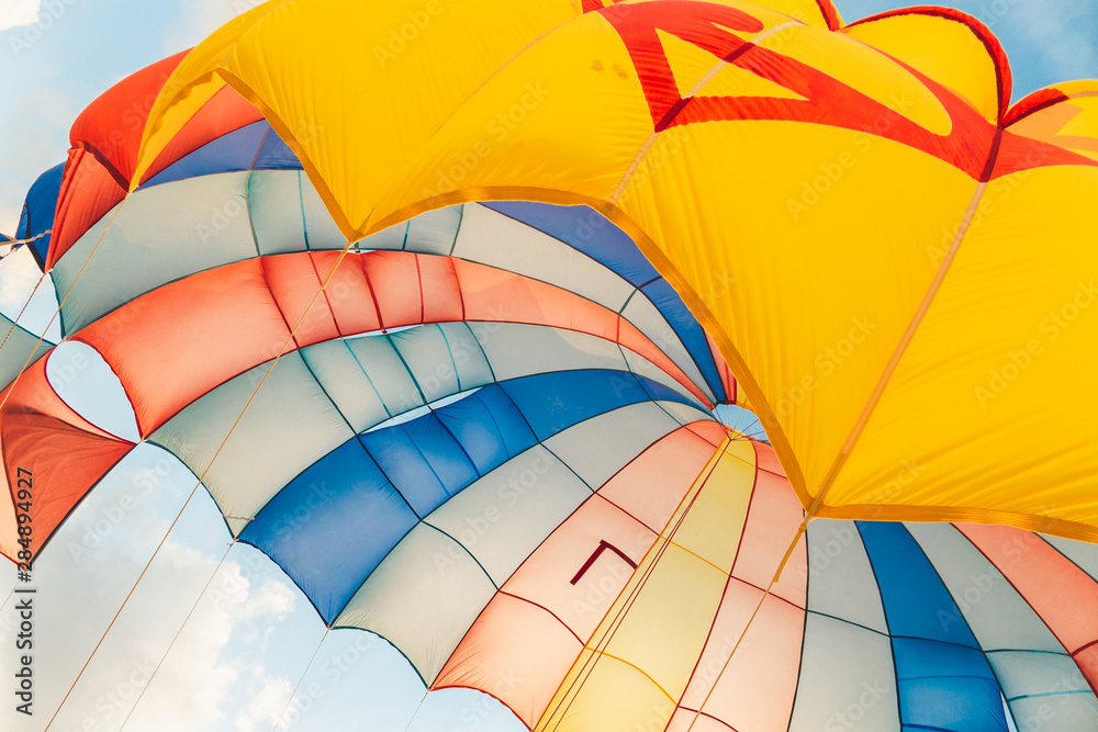 Obraz premium Color parachute kite in the sky