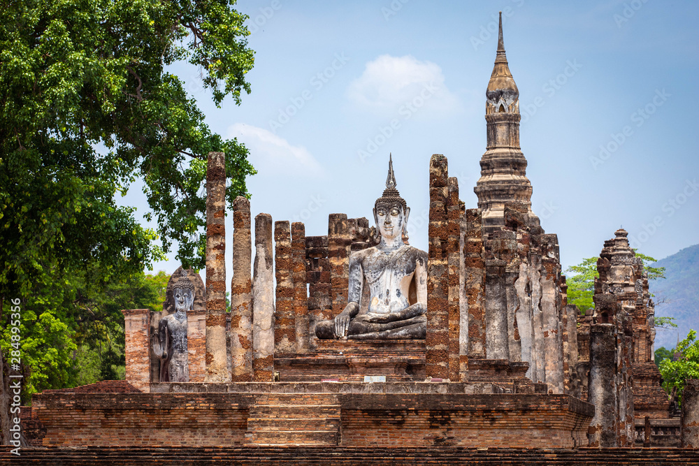 Naklejka premium Buddha image in Sukhothai Historical Park, Temple Thailand