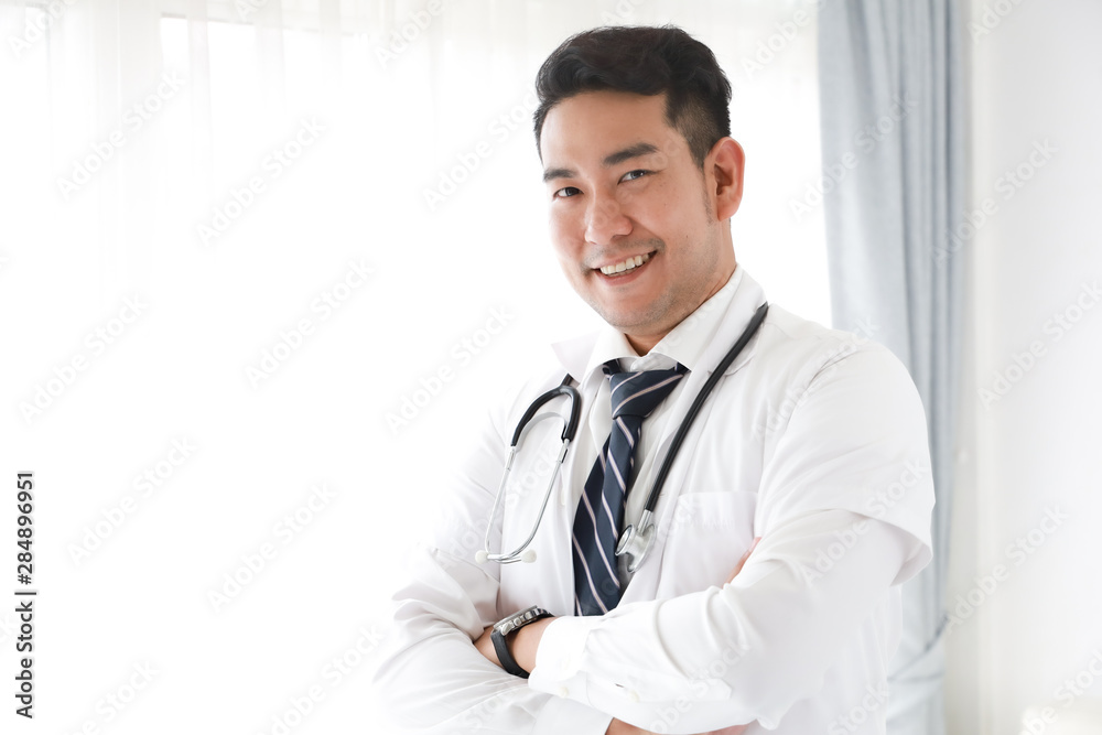 portait of Asian doctor in hospital white background