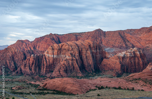 Snow Canyon State Park red sandstone mountains under a blanket of clouds in Utah photo