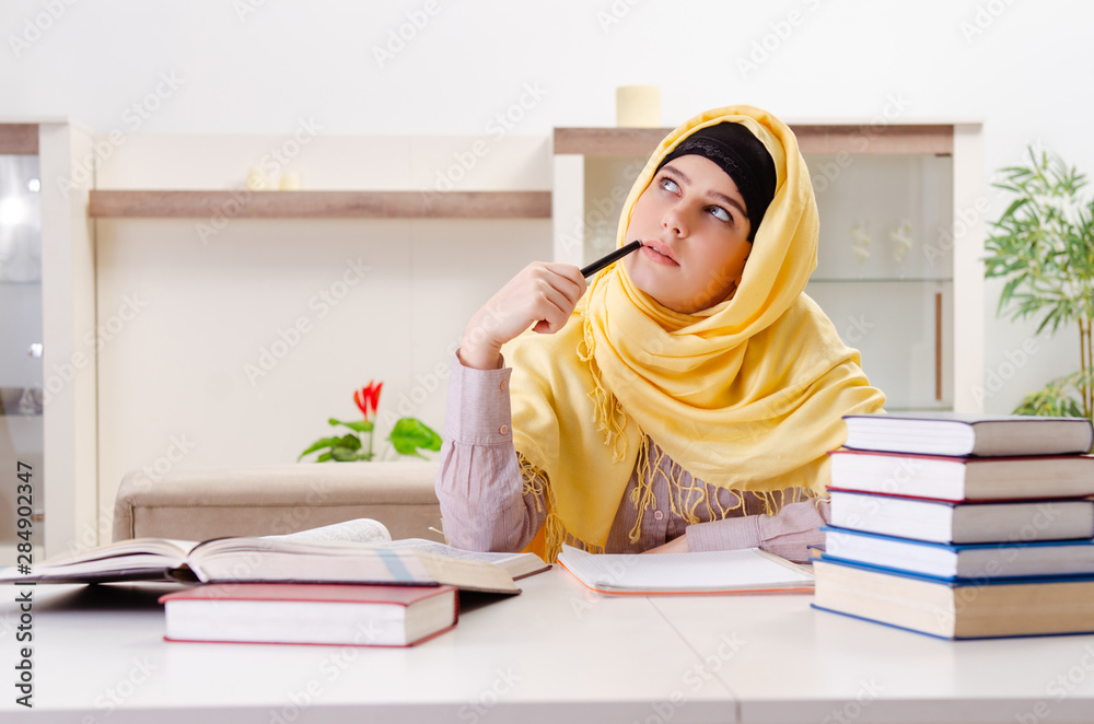 Female student in hijab preparing for exams Female student in hijab preparing for exams