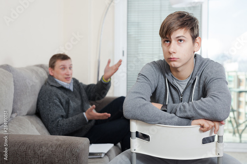 Εκτύπωση καμβά Silent resentment between father and teenager son