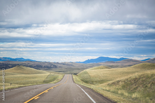 Driving south on scenic route Highway 287 south of Augusta, Central Montana, USA.