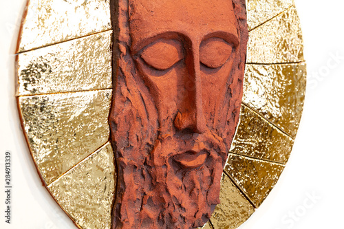 Bratislava, Slovakia. 2018/5/22. A relief sculpture of Jesus' face. Made out of modelling clay by Lubo Michalko. Displayed in the Quo Vadis Catholic House. photo