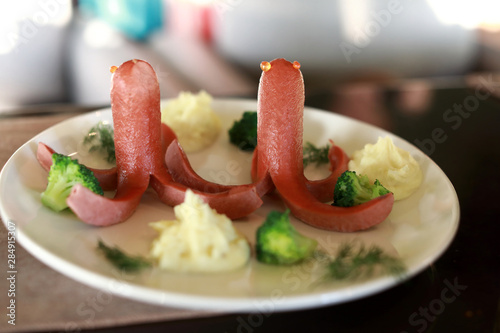 Fotografie Octopus sausages on plate