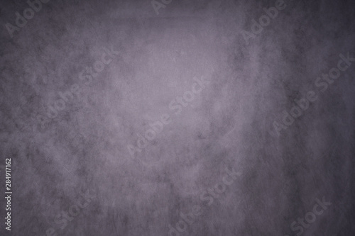 blue grey abstract background, the Studio wall is illuminated by constant light