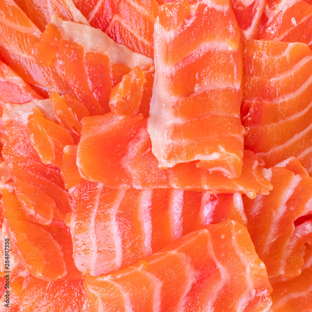 slices of salted red trout fish close-up