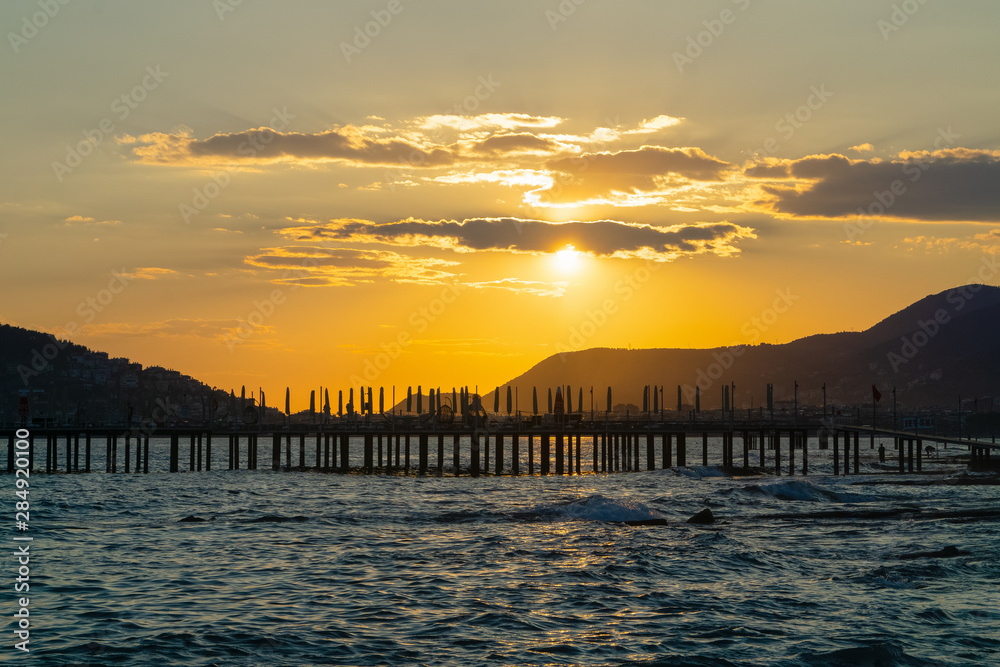 Fototapeta premium silhouette of alanya city at sunset