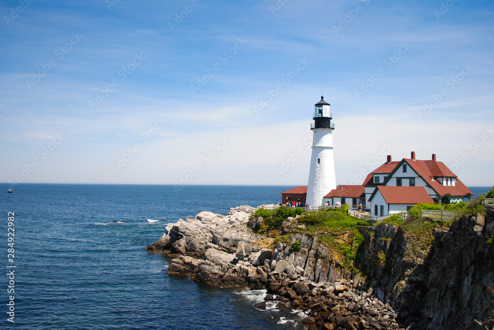 Beautiful lighthouse on the rocks of New England