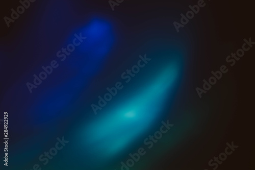 Fototapeta Naklejka Na Ścianę i Meble -  Defocused blue glow. Dark abstract art background. Colored lens flare light leak.