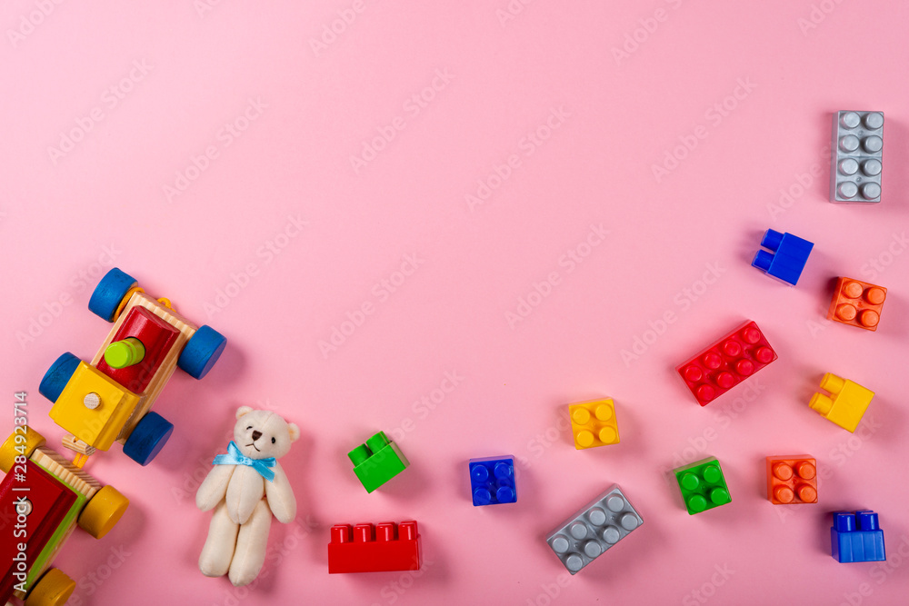 Wooden train on pink background with space for text. Wooden train on pink background with space for text.