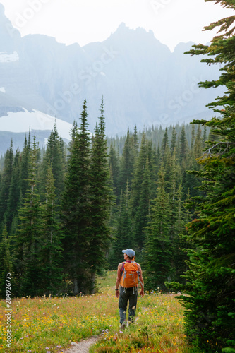 A woman hiking, Siyeh Pass hike, Glacier National Park, Montana, USA photo