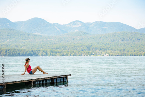 A woman at Whitefish Lake, Whitefish, Glacier Country, Montana, USA. photo