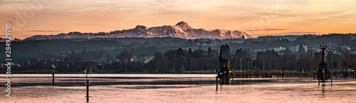 Saentis at sunset with lake constance photo