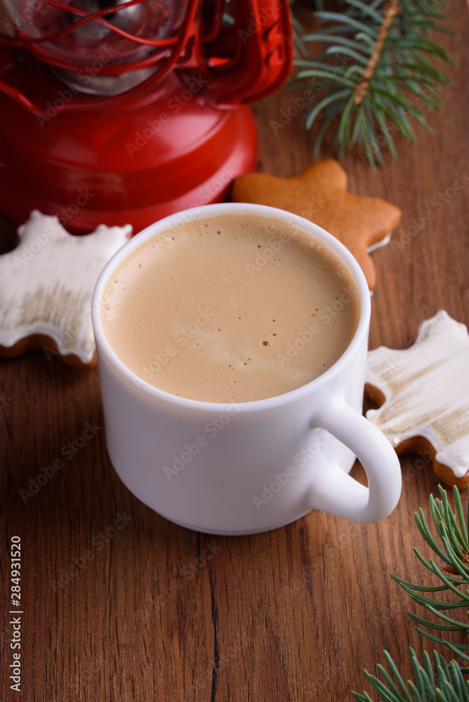 Homemade Christmas cookies with spices, and coffee with milk