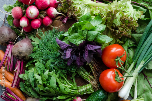 Background texture with assorted raw organic vegetables