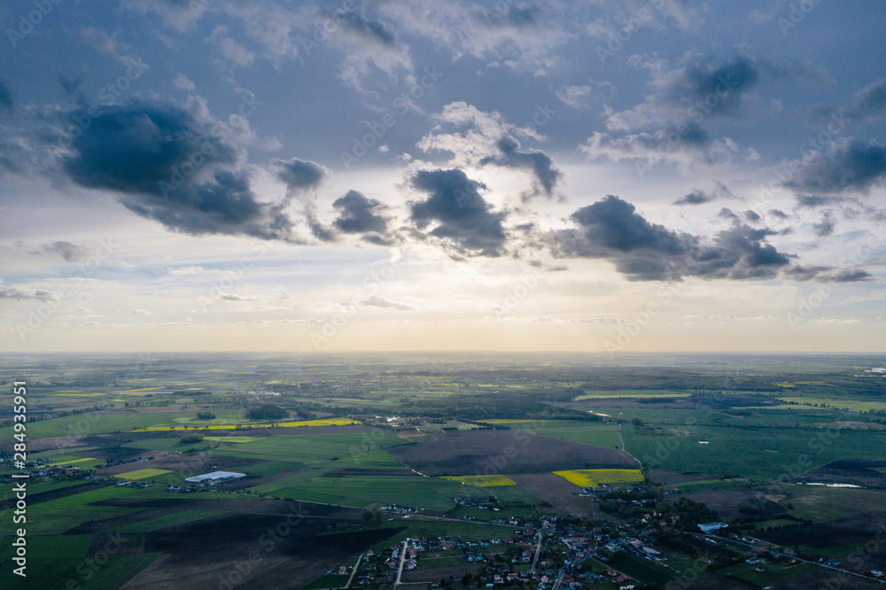 Aerial drone photography of agricultural fields. Beautiful rural landscape of Greater Poland.